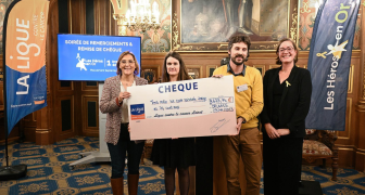 Remise de chèque des Héros en Or